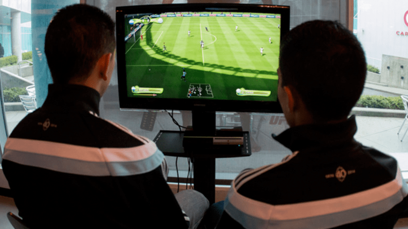 'Caps playing FIFA at EA Sports