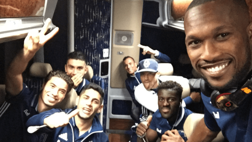 Waston celebrating on bus after Champions League win