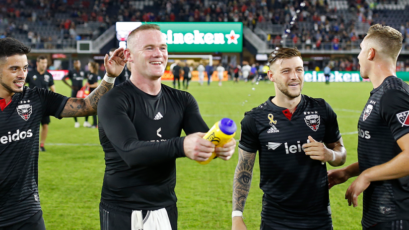 Wayne Rooney - DC United - Squirts water bottle in celebration with teammates