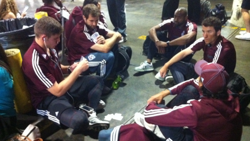 Rapids players play cards during a tornado warning at DIA