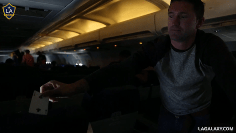 Robbie Keane does magic tricks on a plane