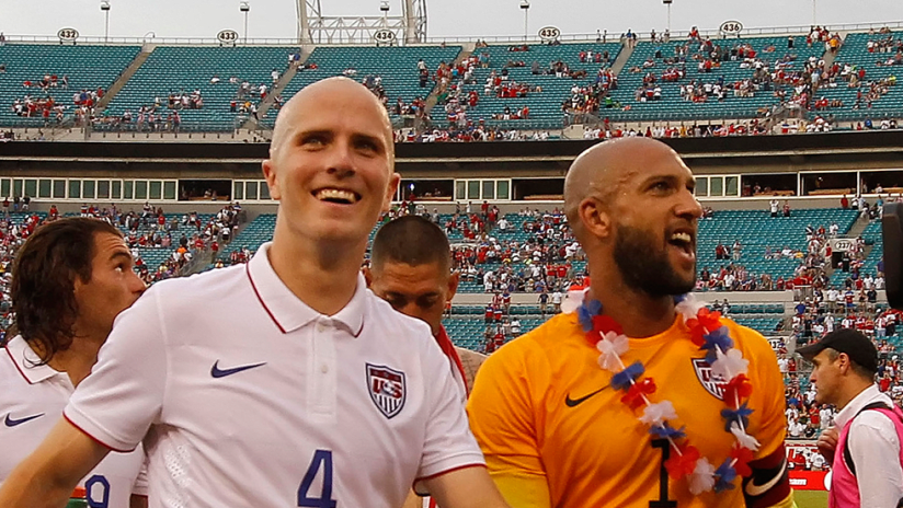 Michael Bradley, Tim Howard - US national team - smiling to fans in Jacksonville, 2014