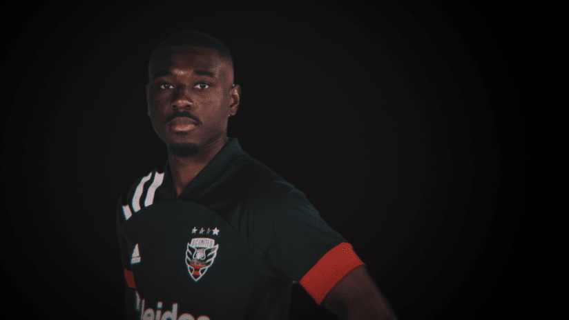 Chris Odoi-Atsem - portrait against black background - use only for special posts
