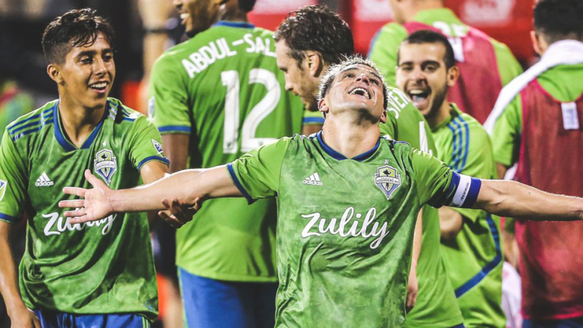 Nicolas Lodeiro - Seattle Sounders - arms wide in celebration