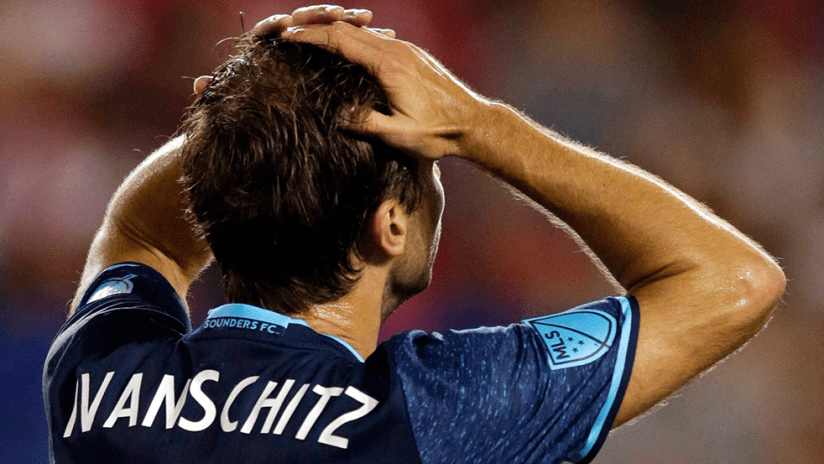 Andreas Ivanschitz - Seattle Sounders - holding head with back to camera