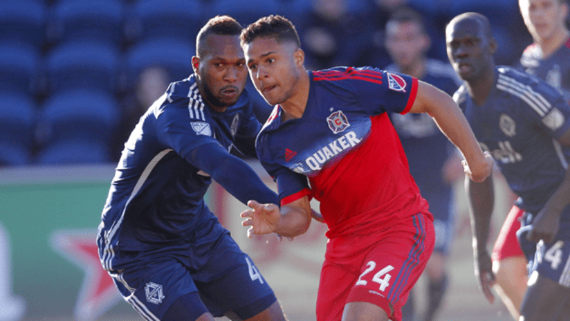 Vancouver Whitecaps defender Kendall Waston and Chicago Fire forward Quincy Amarikwa
