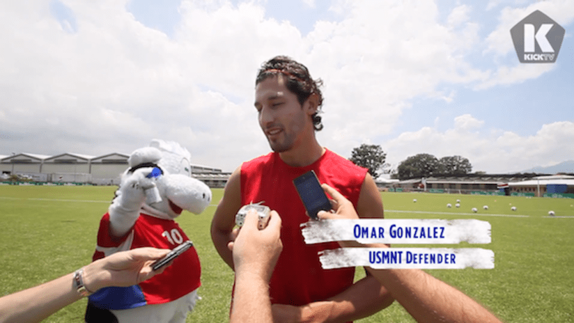 Omar Gonzalez with the Costa Rican dairy cow mascot
