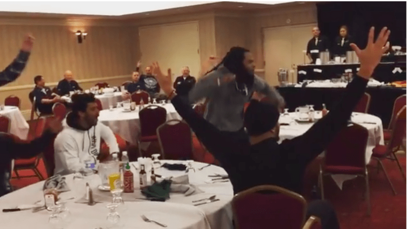 Seahawks cheering in hotel - thumbnail only
