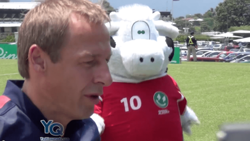 Jurgen Klinsmann with a cow mascot — Costa Rica, September, 2013
