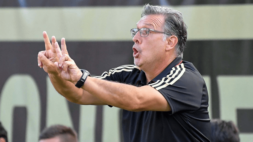 Gerardo "Tata" Martino - Atlanta United - Excited with two fingers up on each hand