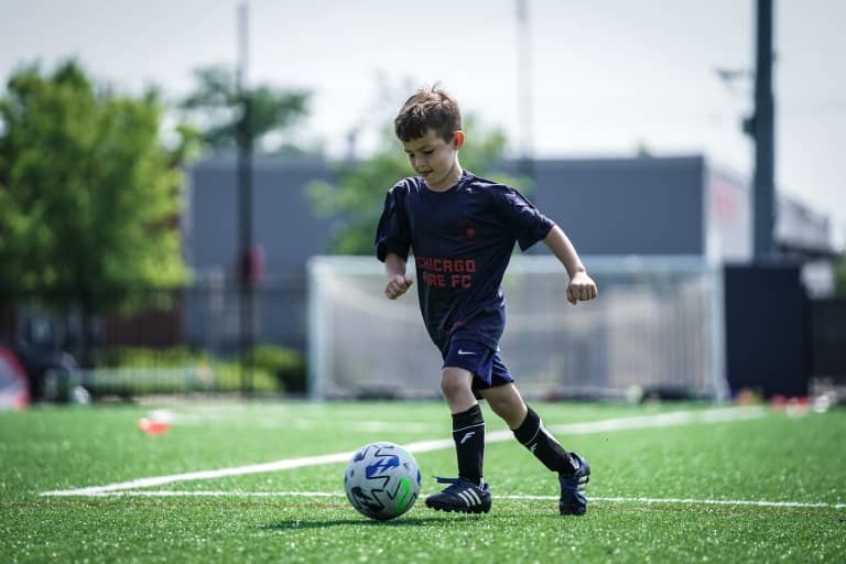 youth soccer summer camp player
