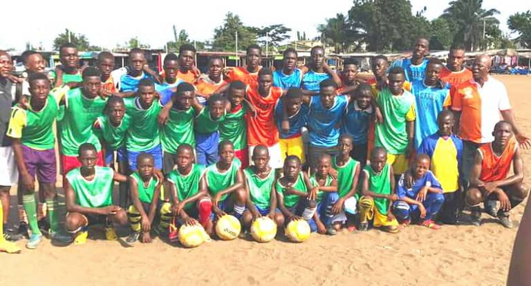 United academy player travels to Africa to deliver soccer equipment -