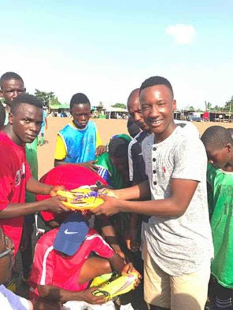 United academy player travels to Africa to deliver soccer equipment -