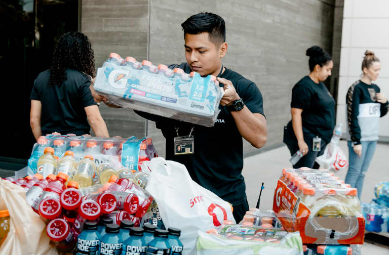 LAFC Fans Deliver Water And Drinks To Firefighters And Victims Of Los Angeles Wildfires 10/30/19 - https://la-mp7static.mlsdigital.net/elfinderimages/Photos/Events/191030_WaterDonationFirefighters/191030_LAFD_IB_4.jpg