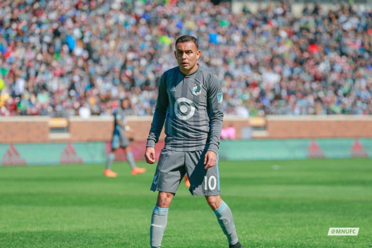 Notes & Quotes: MNUFC vs. Chicago Fire - Miguel Ibarra stands over the ball with a full crowd behind him.