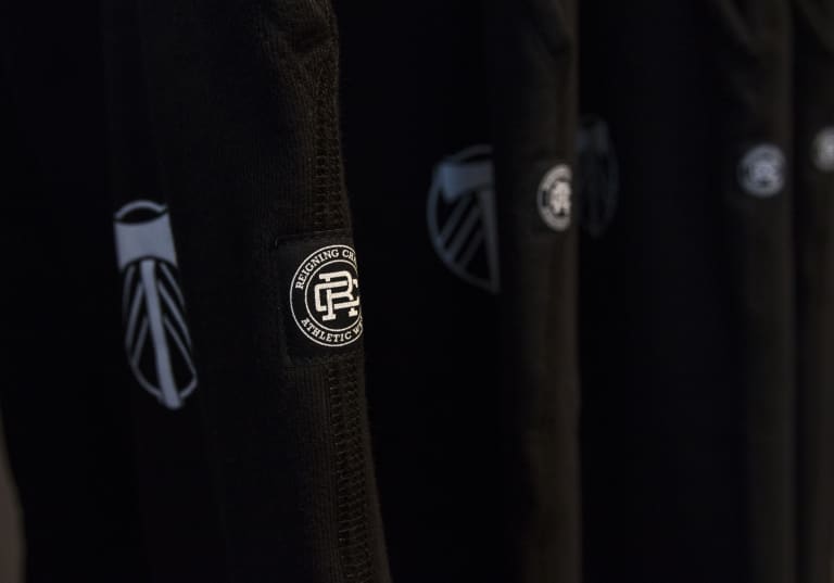 Reigning Champ unveils Portland Timbers capsule collection at party in the Pearl District - https://league-mp7static.mlsdigital.net/images/ReigningChampRackCloseup.JPG?null