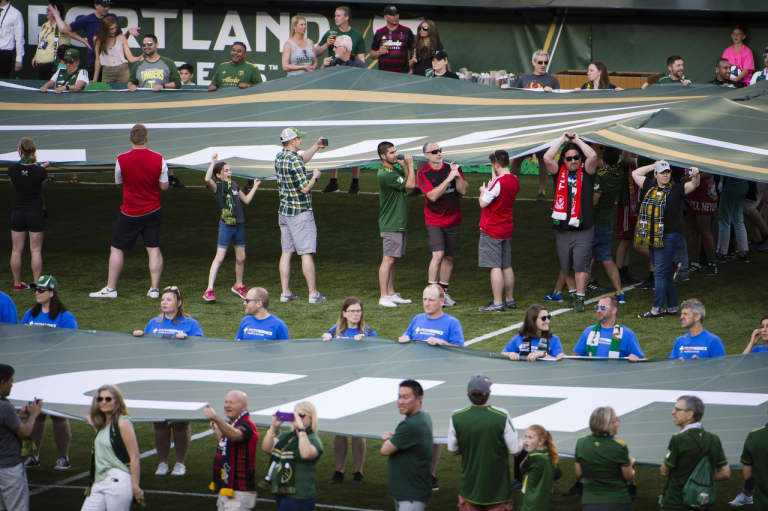 Team photographer Craig Mitchelldyer discusses some of his favorite images from his fellow shooters of the Timbers home opener -
