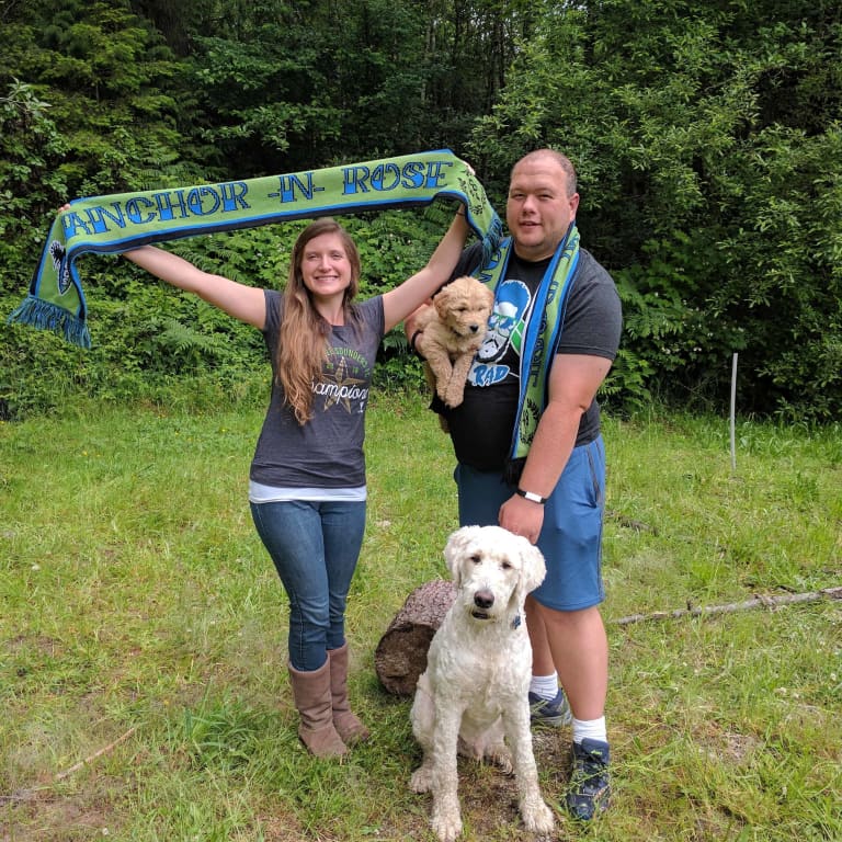 Sounders supporters surprise parents with "Grandpa" and "Grandma" jerseys in epic baby reveal -