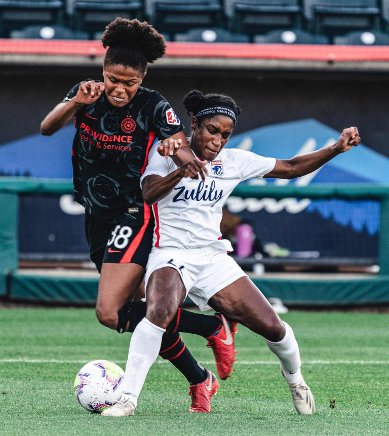 Steve Zakuani chats with OL Reign's Jasmyne Spencer on National Girls and Women in Sports Day -