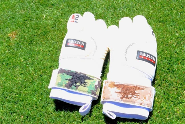 Bid now, support the Navy SEAL Foundation: Busch's game-worn gloves & cleats -