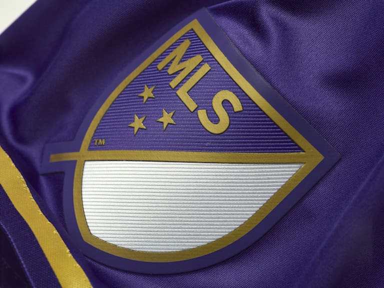 Orlando City SC release new secondary jersey for 2016 - https://league-mp7static.mlsdigital.net/images/orlandocityjerseycrestdetail.jpg?null
