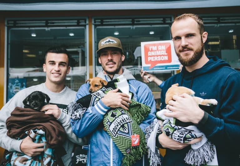 The Seattle Sounders spread #GoodPlayoffKarma with an adoption event for rescue puppies and kittens | SIDELINE - https://league-mp7static.mlsdigital.net/images/brosanddogs.jpg