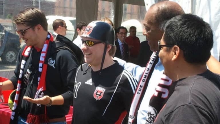 Commentary: What a new stadium really means for DC United and MLS - //league-mp7static.mlsdigital.net/mp6/imagecache/620x350/image_nodes/2013/07/Fans-and-Marion-Barry-at-DCU-stadium-presser.jpg