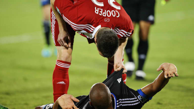 FC Dallas manager Schellas Hyndman says history may have been a factor in red cards to Kenny Cooper, Victor Bernardez -