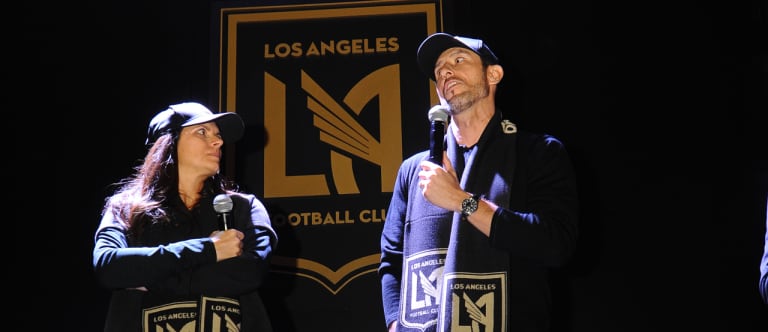 LAFC fans excited about logo at launch party, get hands on merchandise - https://league-mp7static.mlsdigital.net/images/Nomar-and-Mia.jpg