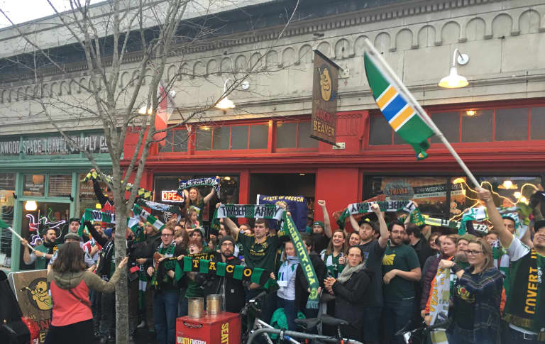 TA:CO, a group of covert Portland Timbers fans, rep for the Timbers Army in Seattle - https://league-mp7static.mlsdigital.net/images/TACO%20at%20Angry%20Beaver.jpeg?null