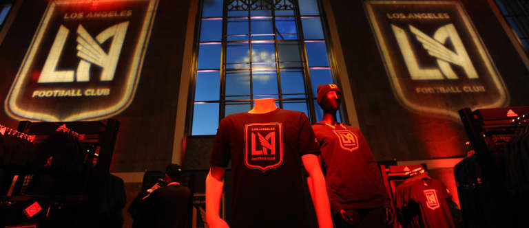 LAFC fans excited about logo at launch party, get hands on merchandise - https://league-mp7static.mlsdigital.net/images/LAFC-Launch-Party-Merch.jpg