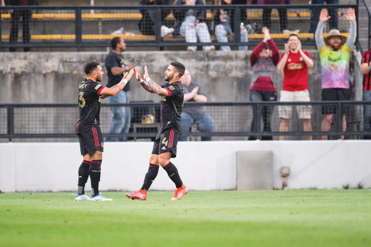 Atlanta United forward Dom Dwyer #4 celebrates with midfielder Jake Mulraney #23 after scoring a goal during the match against Chattanooga FC at Fifth Third Bank Stadium in Kennesaw, United States on Wednesday April 20, 2022. (Photo by Kyle Hess/Atlanta United)