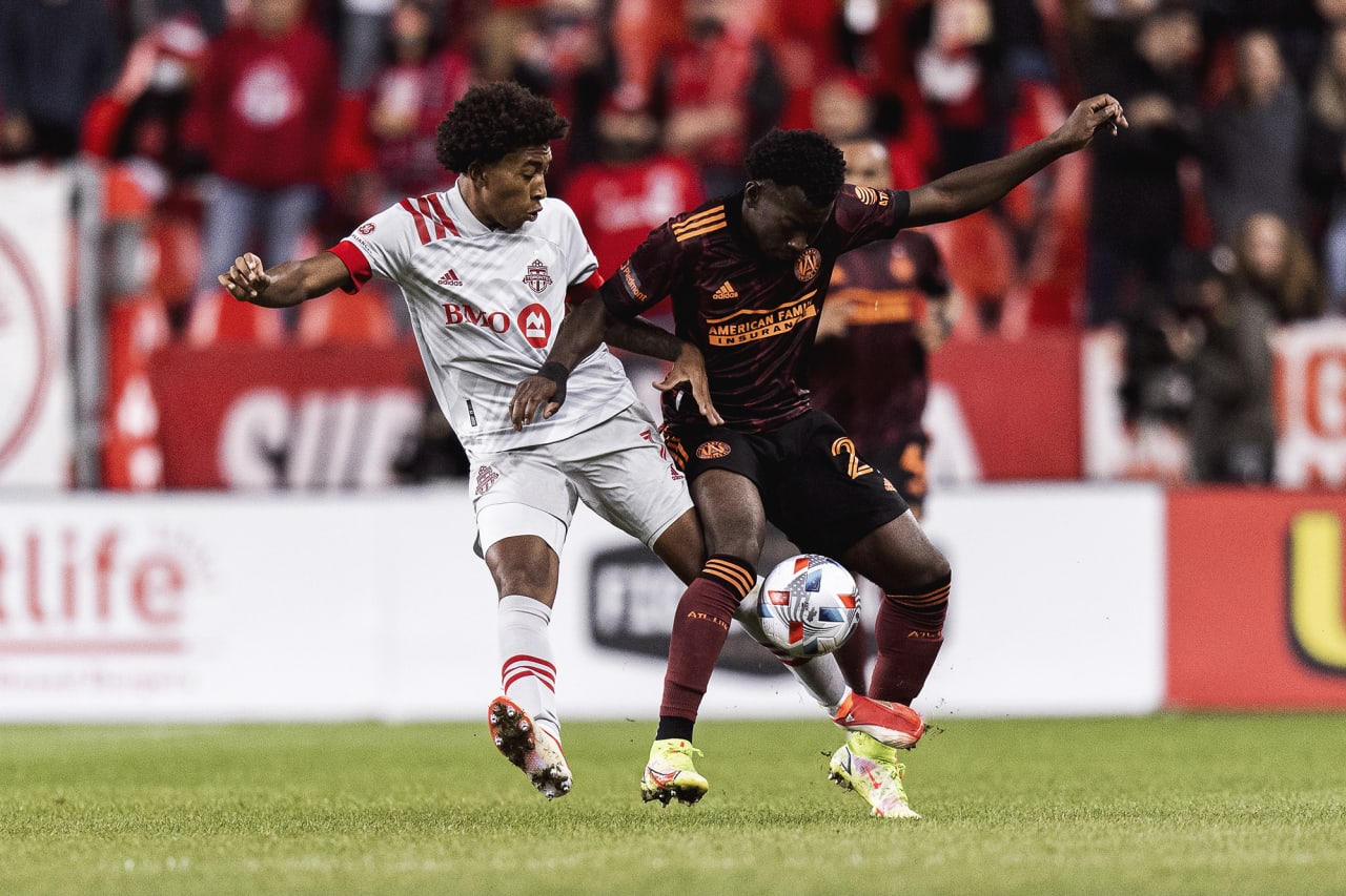 Atlanta United defender George Bello #21 dribbles the ball during the match against Toronto FC at BMO Training Ground in Toronto, Ontario on Saturday October 16, 2021. (Photo by Jacob Gonzalez/Atlanta United)