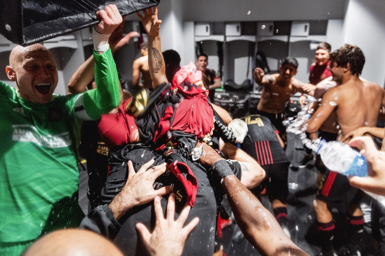 Atlanta United players celebrate in the locker room after the match against Columbus Crew at Lower.com Field in Columbus, Ohio on Saturday August 7, 2021. (Photo by Jacob Gonzalez/Atlanta United)