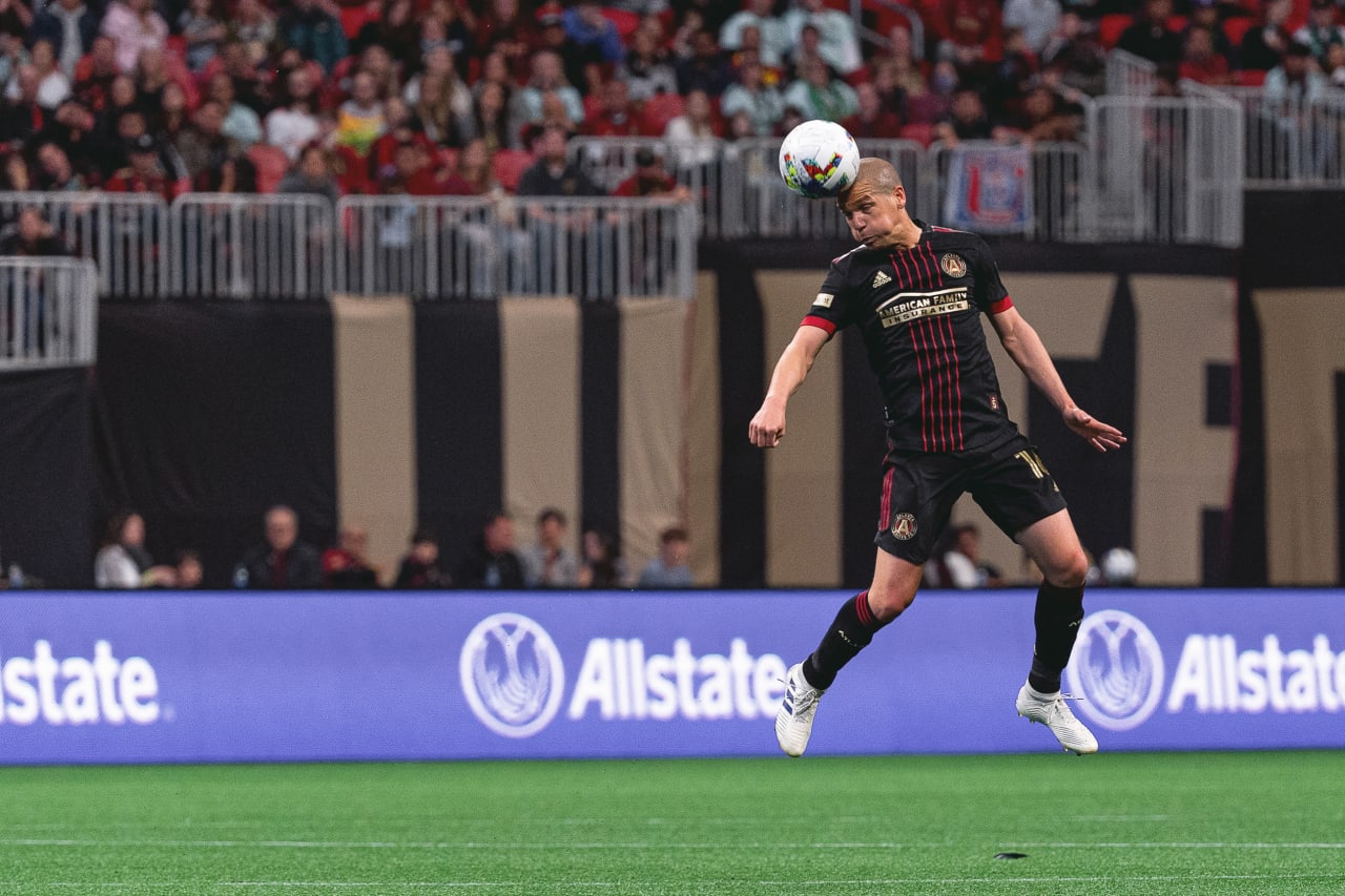 Atlanta United defender Andrew Gutman #15 goes up for the ball during the 2022 Opening Day match against Charlotte FC at Mercedes-Benz Stadium in Atlanta, United States on Sunday March 13, 2022. (Photo by Dakota Williams/Atlanta United)