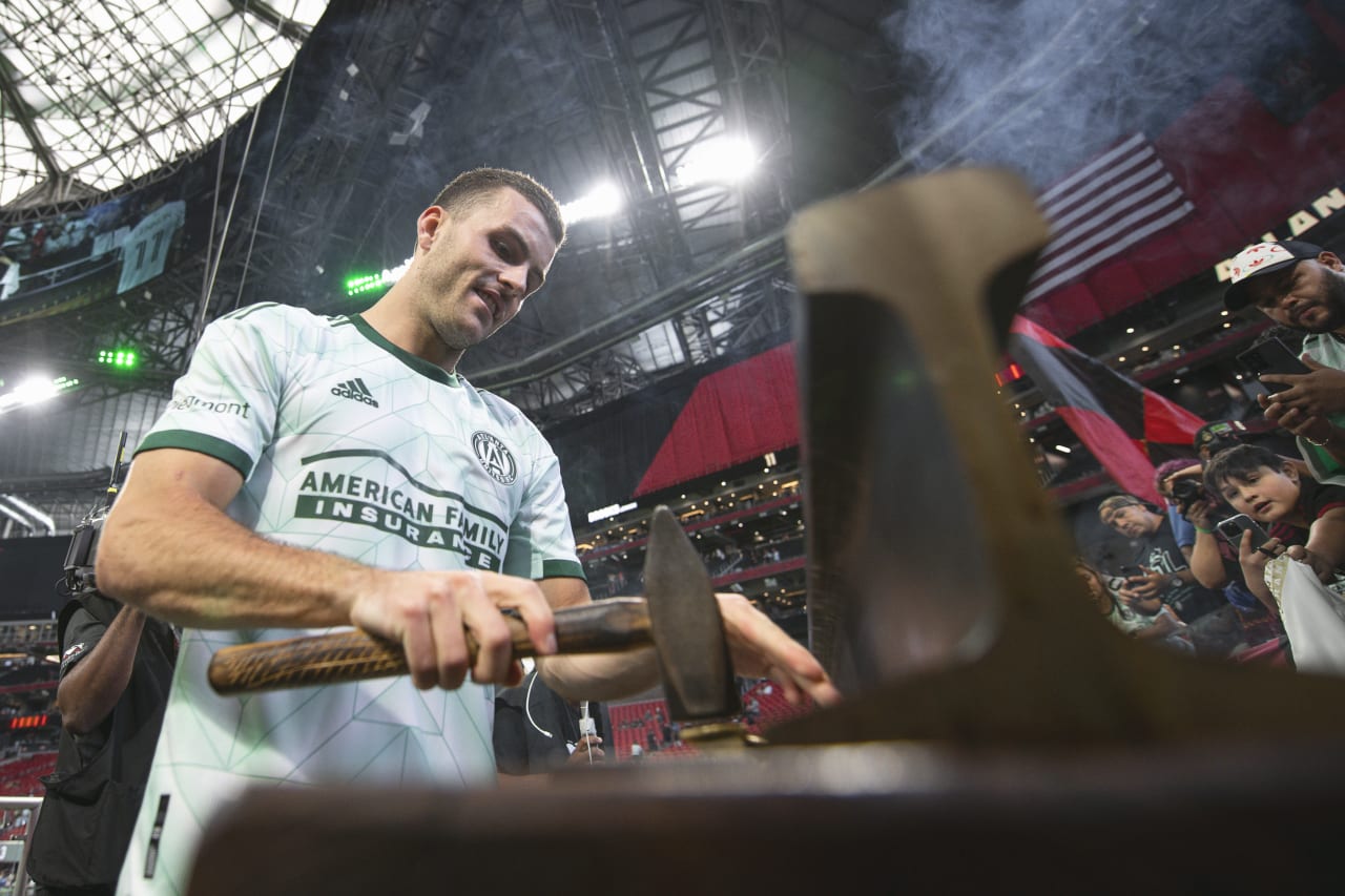 Atlanta United defender Brooks Lennon #11 hits the golden spike during the match against D.C. United at Mercedes-Benz Stadium in Atlanta, United States on Sunday August 28, 2022. (Photo by Jay Bendlin/Atlanta United)