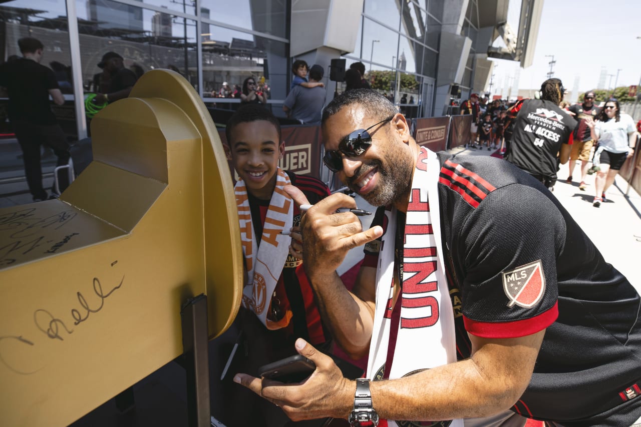Atlanta United supporters sign the spike before the match against  at  in , United States on Sunday June 19, 2022. (Photo by Karl Moore/Atlanta United)