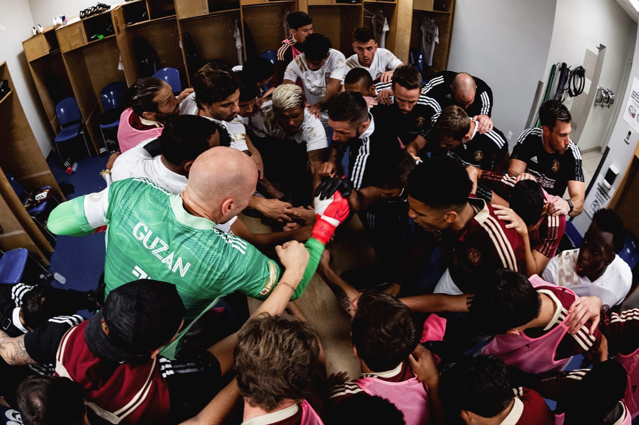 The Atlanta United huddles together in the locker room before the match against CF Montreal at Stade Saputo in Montreal, Quebec on Wednesday August 4, 2021. (Photo by Jacob Gonzalez/Atlanta United)