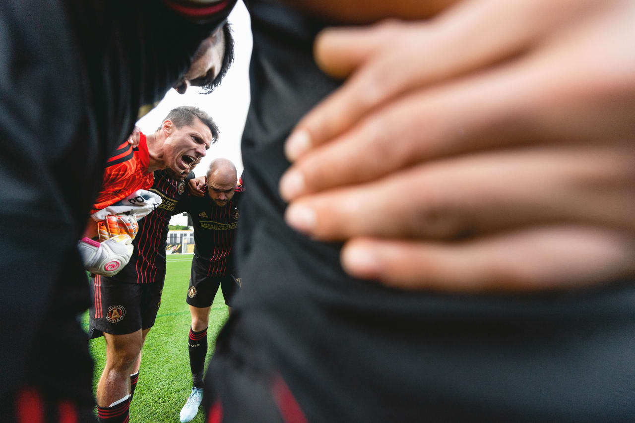 Atlanta United goalkeeper Bobby Shuttleworth #18 huddles with the team before the match against Chattanooga FC at Fifth Third Bank Stadium in Kennesaw, United States on Wednesday April 20, 2022. (Photo by Dakota Williams/Atlanta United)