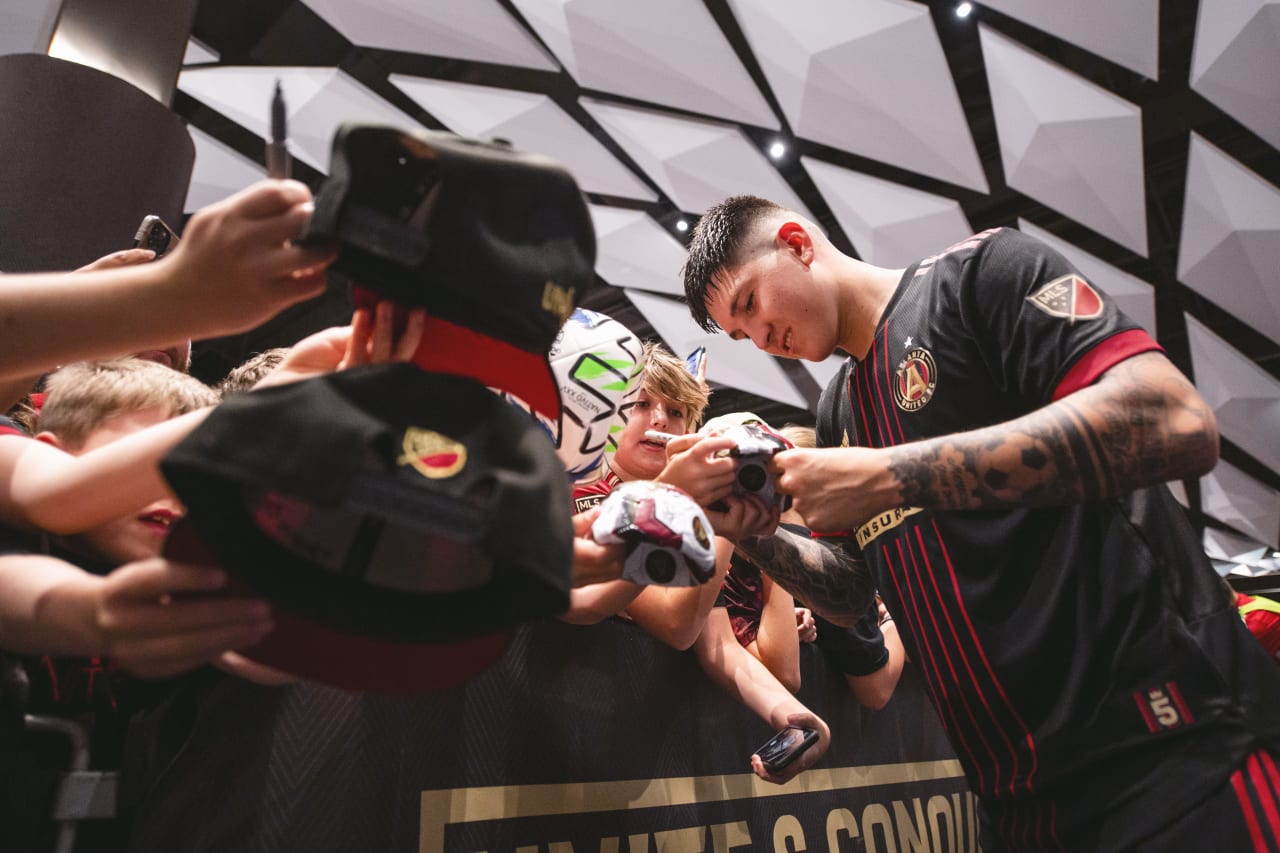 Atlanta United midfielder Franco Ibarra #14 interacts with supporters after the match against New England Revolution at Mercedes-Benz Stadium in Atlanta, United States on Sunday May 15, 2022. (Photo by Dakota Williams/Atlanta United)