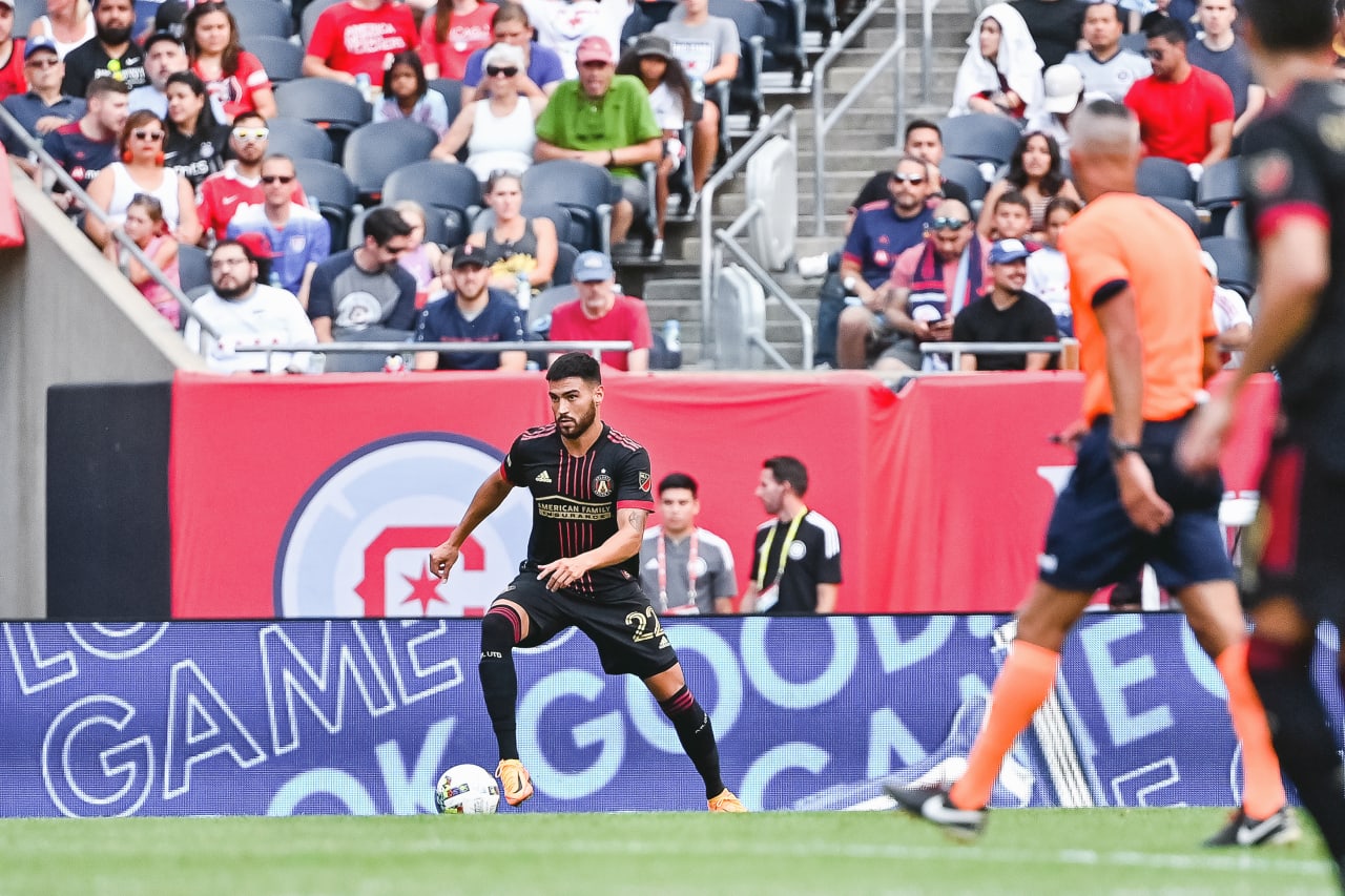 Atlanta United defender Juan José Sanchez Purata #22 dribbles the ball during the second half of the match against Chicago Fire FC at Soldier Field in Chicago, United States on Saturday July 30, 2022. (Photo by Dakota Williams/Atlanta United)