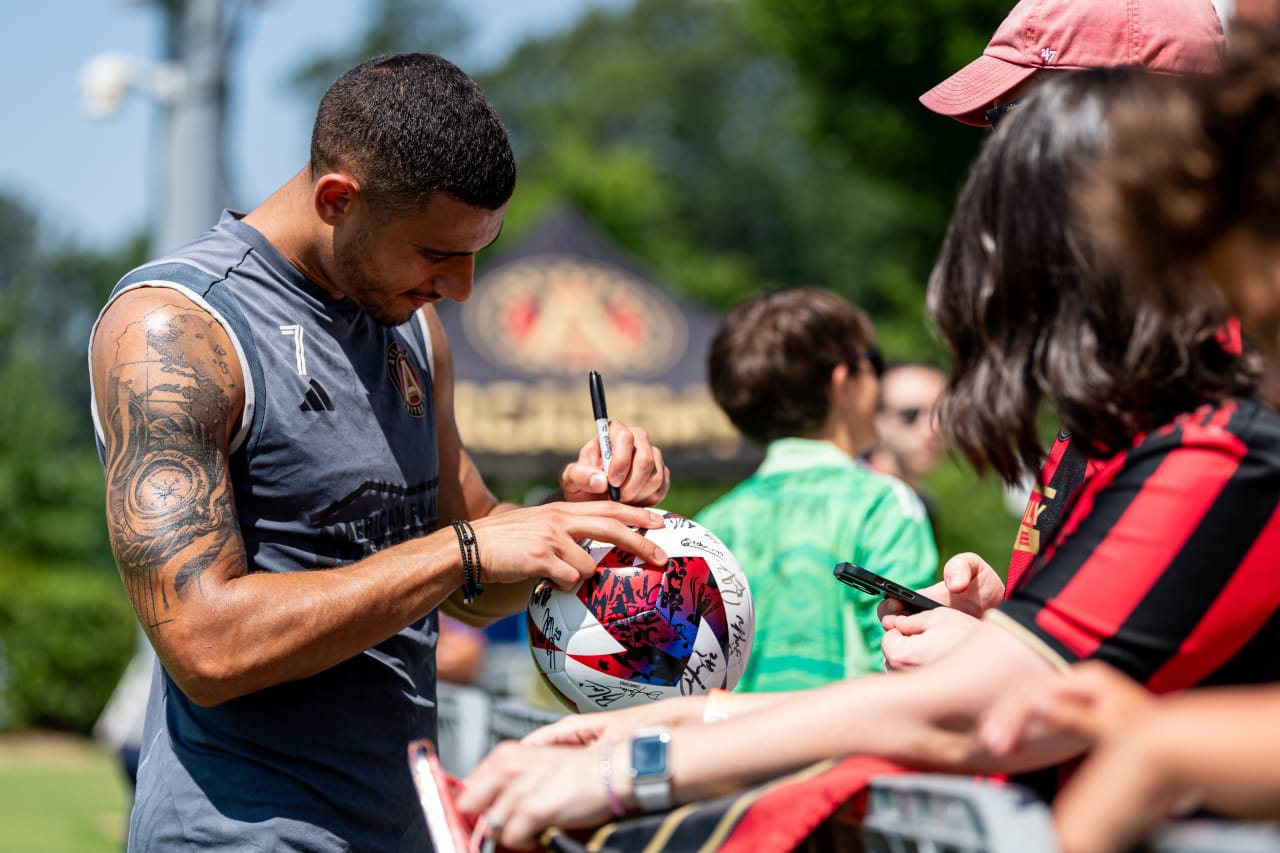 Atlanta United forward Giorgos Giakoumakis #7 signs an autograph after a training session at Children's Healthcare of Atlanta Training Ground in Marietta, Ga., on Wednesday, June 28, 2023. (Photo by Mitch Martin/Atlanta United)
