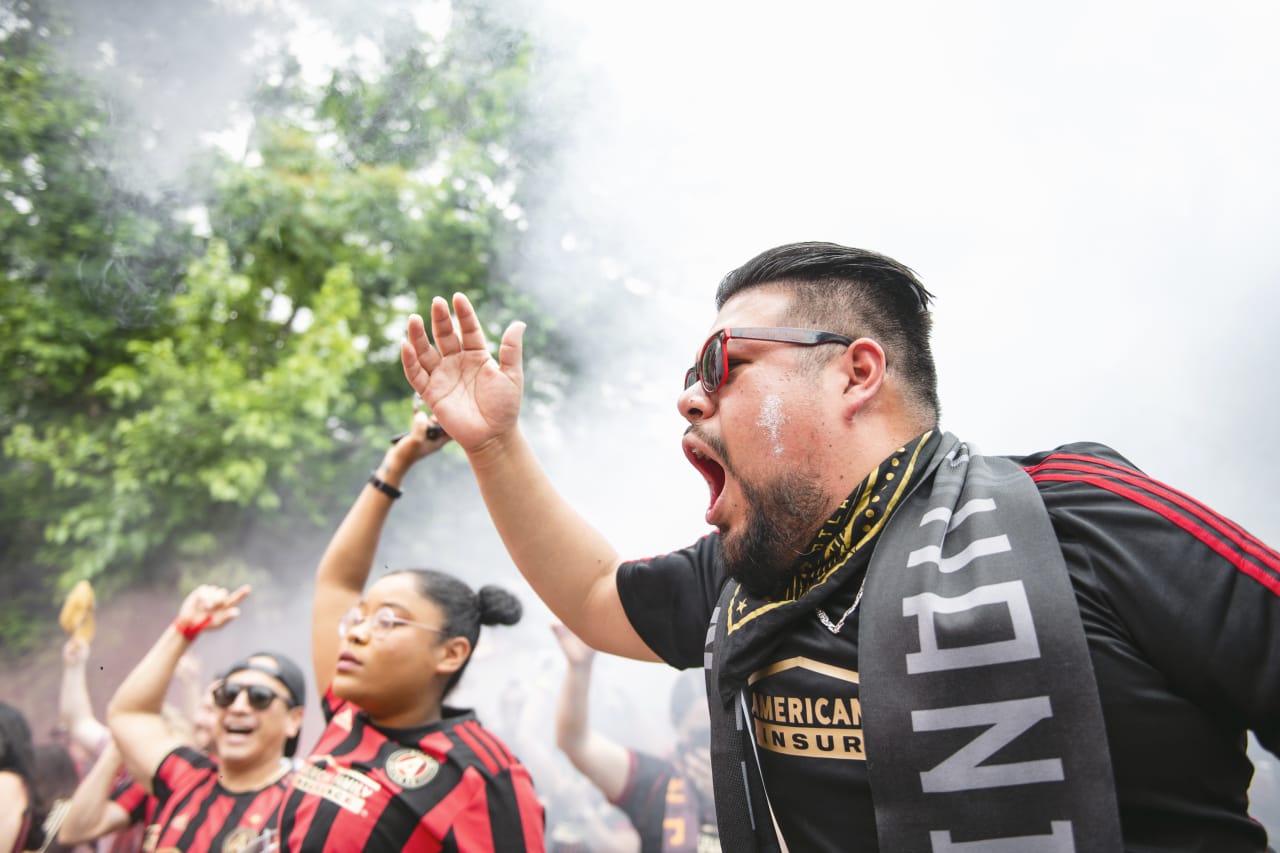 Atlanta United supporters march before the match against New England Revolution at Mercedes-Benz Stadium in Atlanta, United States on Sunday May 15, 2022. (Photo by Mitchell Martin/Atlanta United)