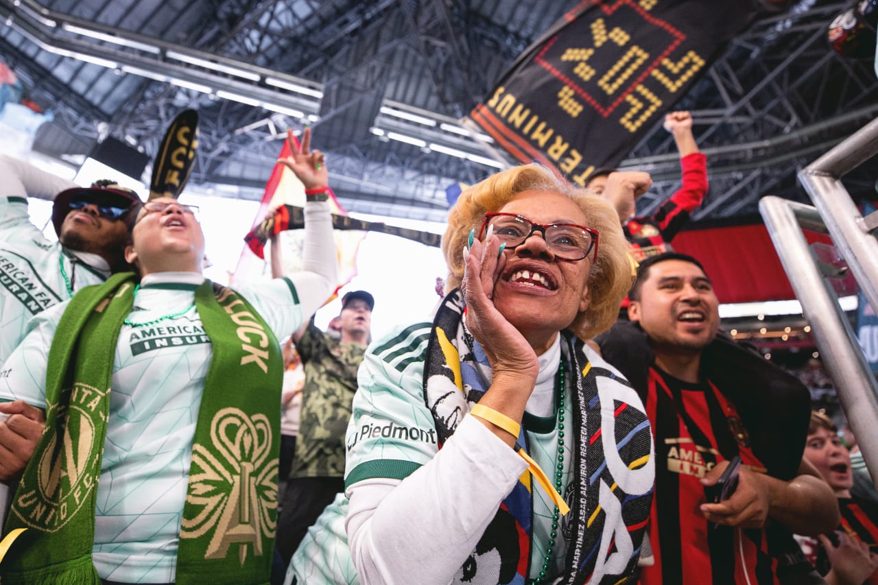 Atlanta United supporters cheer during the 2022 Opening Day match against Charlotte FC at Mercedes-Benz Stadium in Atlanta, United States on Sunday March 13, 2022. (Photo by Casey Sykes/Atlanta United)