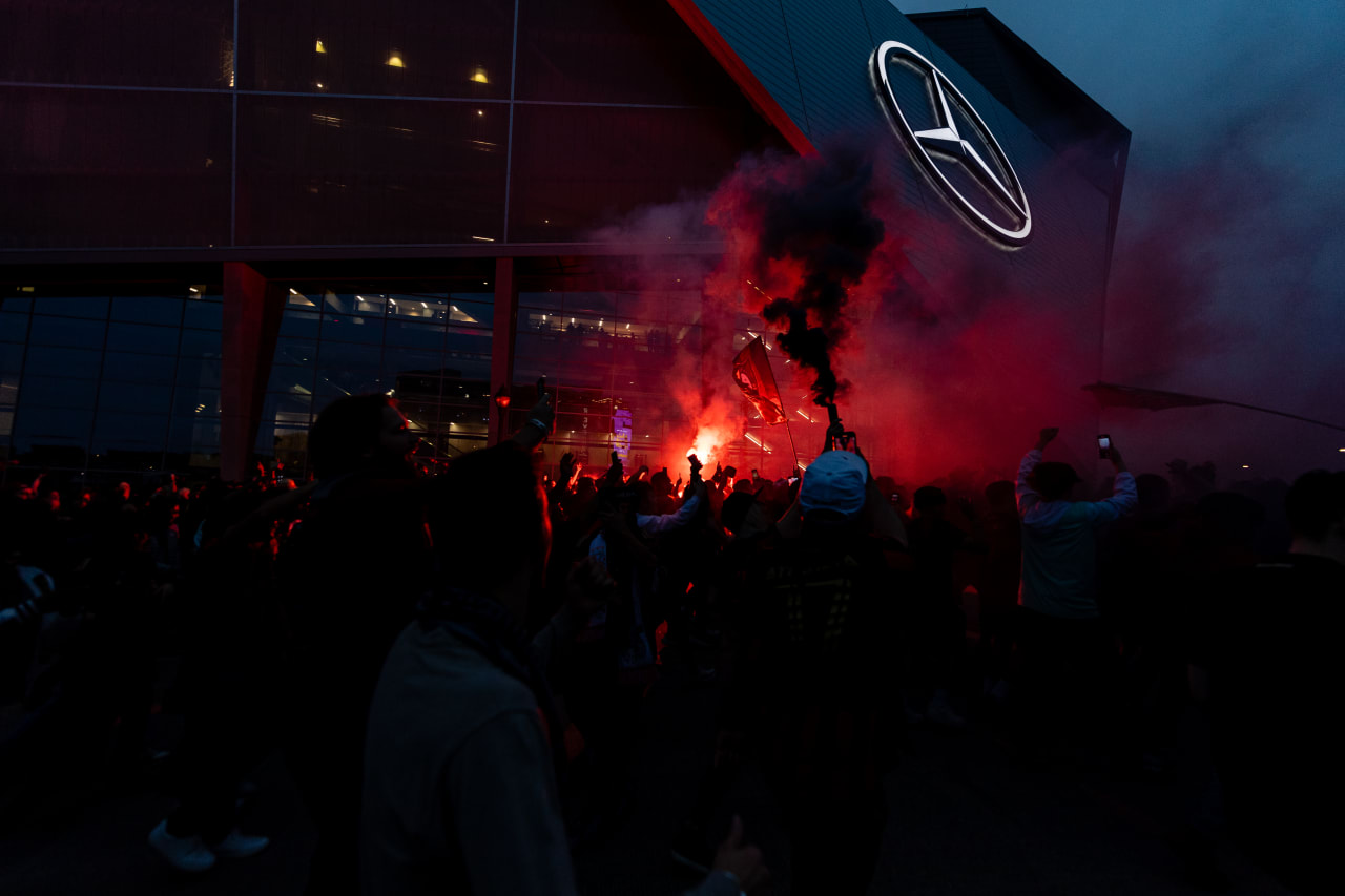 A flare is seen during the supporters march before the match against the San Jose Earthquakes at Mercedes-Benz Stadium in Atlanta, GA on Saturday, February 25, 2023. (Photo by Jay Bendlin/Atlanta United)
