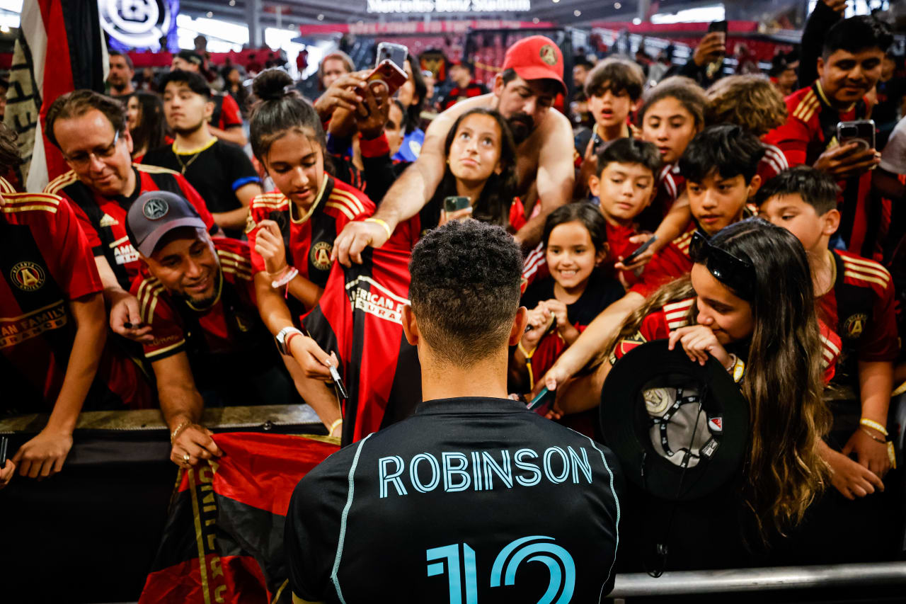Atlanta United defender Miles Robinson #12 wins the golden spike of excellence after the match against Chicago Fire FC at Mercedes-Benz Stadium in Atlanta, GA on Sunday, April 23, 2023. (Photo by Alex Slitz/Atlanta United)