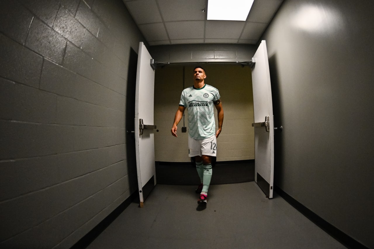 Atlanta United defender Miles Robinson #12 walks out to the pitch before the match against Toronto FC at BMO Field in Toronto, Canada on Saturday, April 15, 2023. (Photo by Brandon Magnus/Atlanta United)