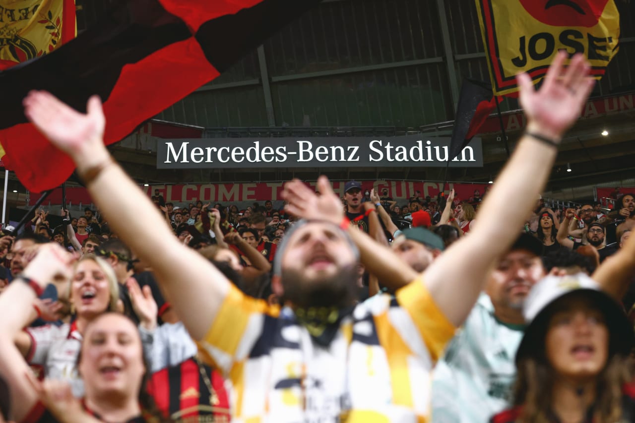 Fans cheer after the victory over Toronto FC at Mercedes-Benz Stadium in Atlanta, United States on Saturday September 10, 2022. (Photo by Casey Sykes/Atlanta United)