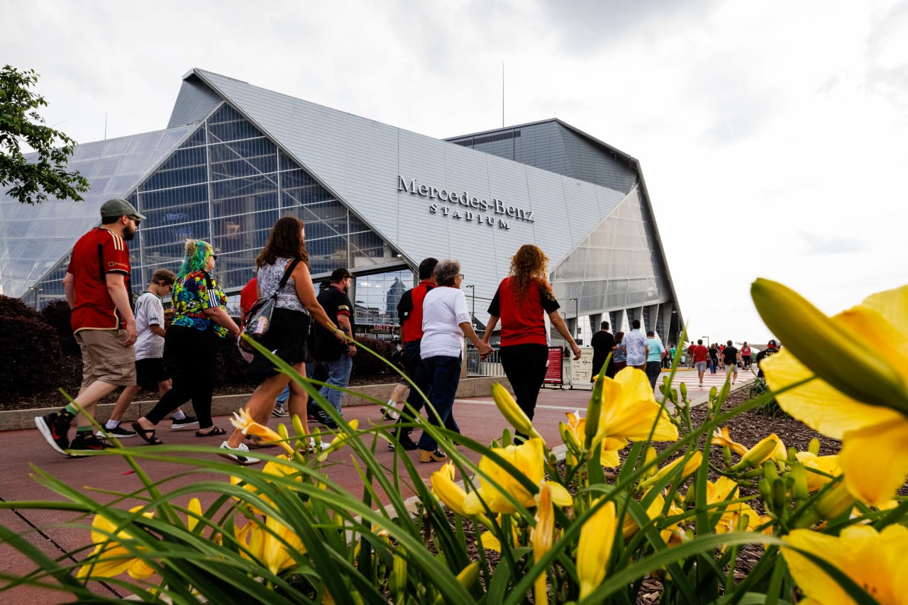 Fans arrive prior to the match against Charlotte FC at Mercedes-Benz Stadium in Atlanta, GA on Saturday May 13, 2023. (Photo by Karl Moore/Atlanta United)