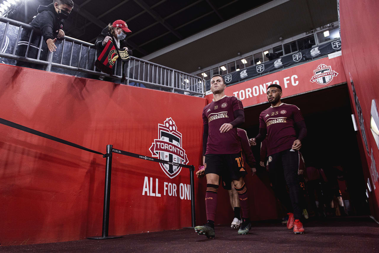 Atlanta United defender Brooks Lennon #11 and midfielder Jake Mulraney #23 walk out onto the field before the match against Toronto FC at BMO Training Ground in Toronto, Ontario on Saturday October 16, 2021. (Photo by Jacob Gonzalez/Atlanta United)